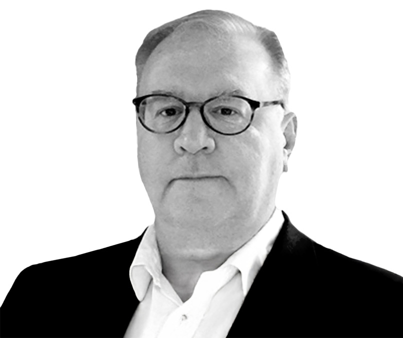 JOHN G. RAVIS